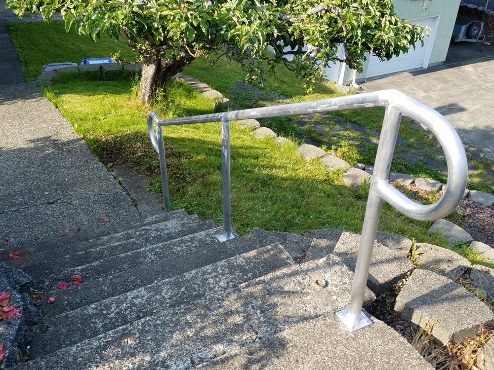 Galvanized handrail on stairs