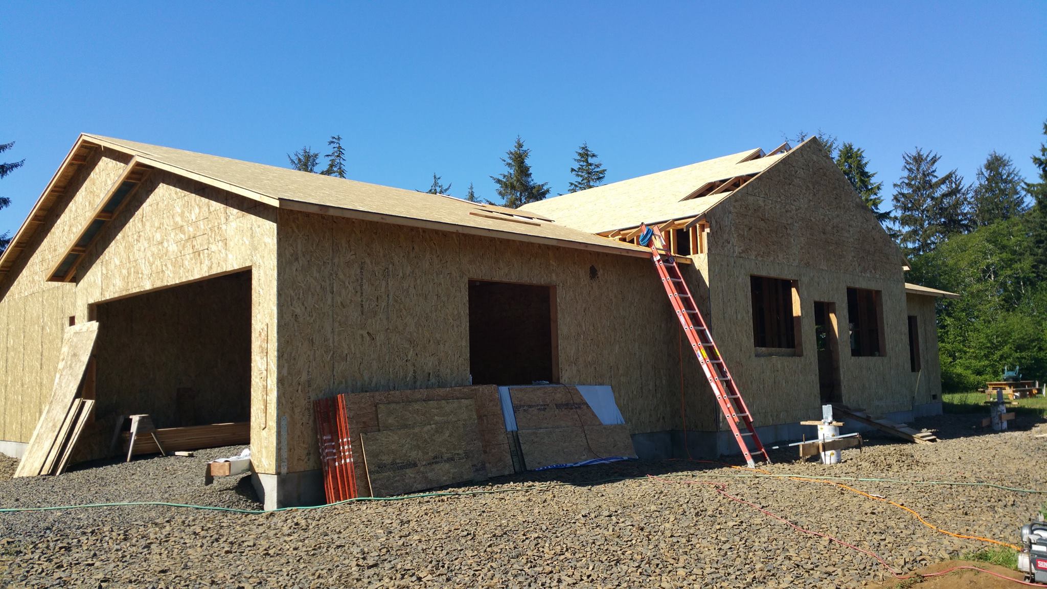 Exterior walls are done, roof underlayment in place